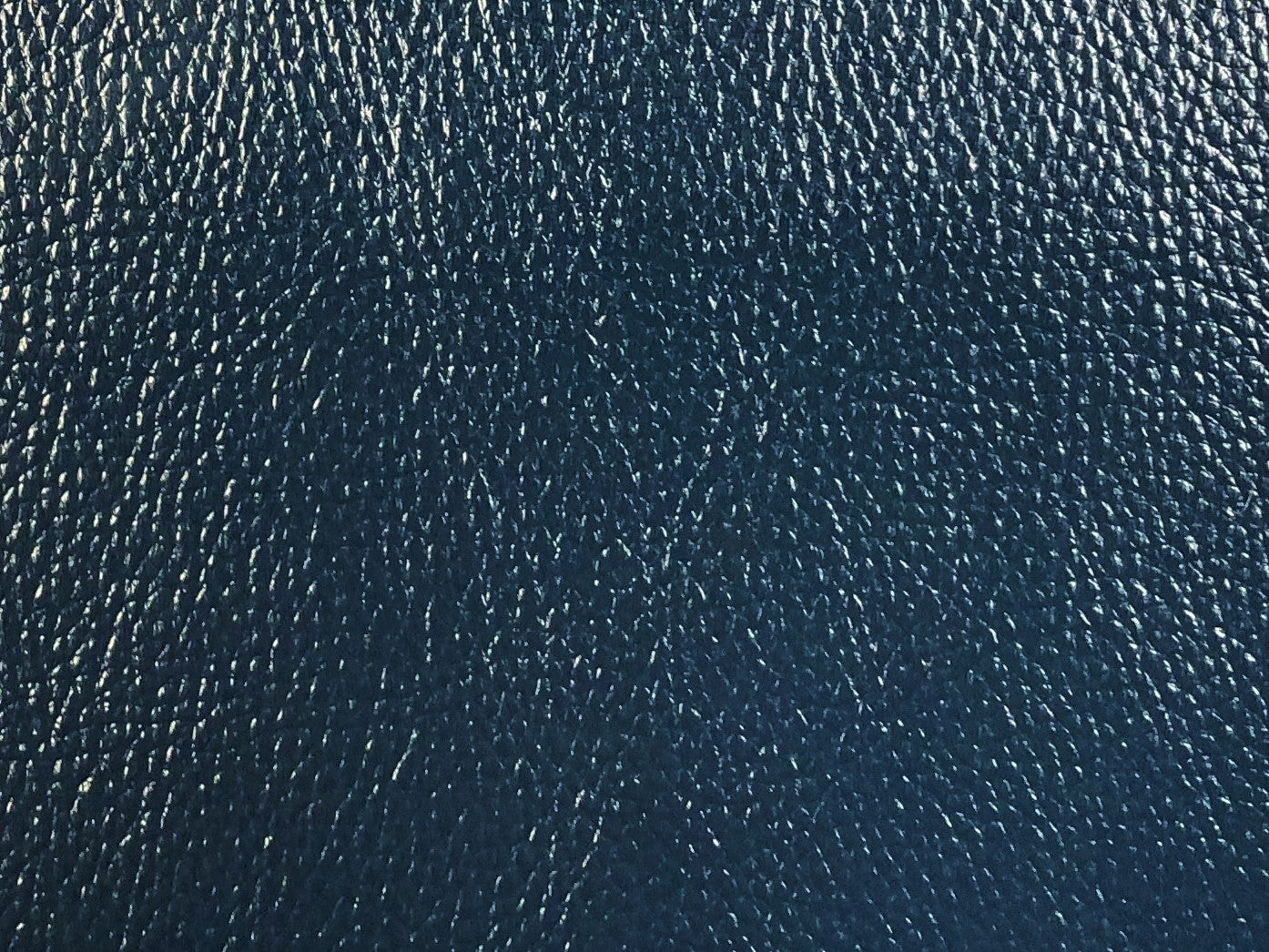 An application scenario or product detail of navy blue faux leather fabric - Image 10