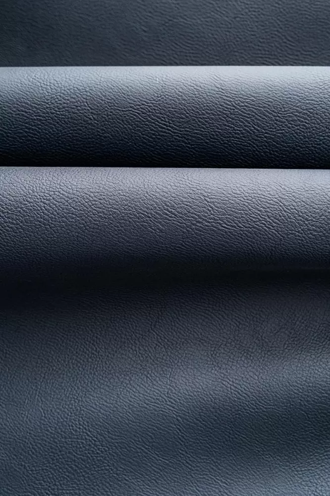 An application scenario or product detail of navy blue faux leather fabric - Image 19