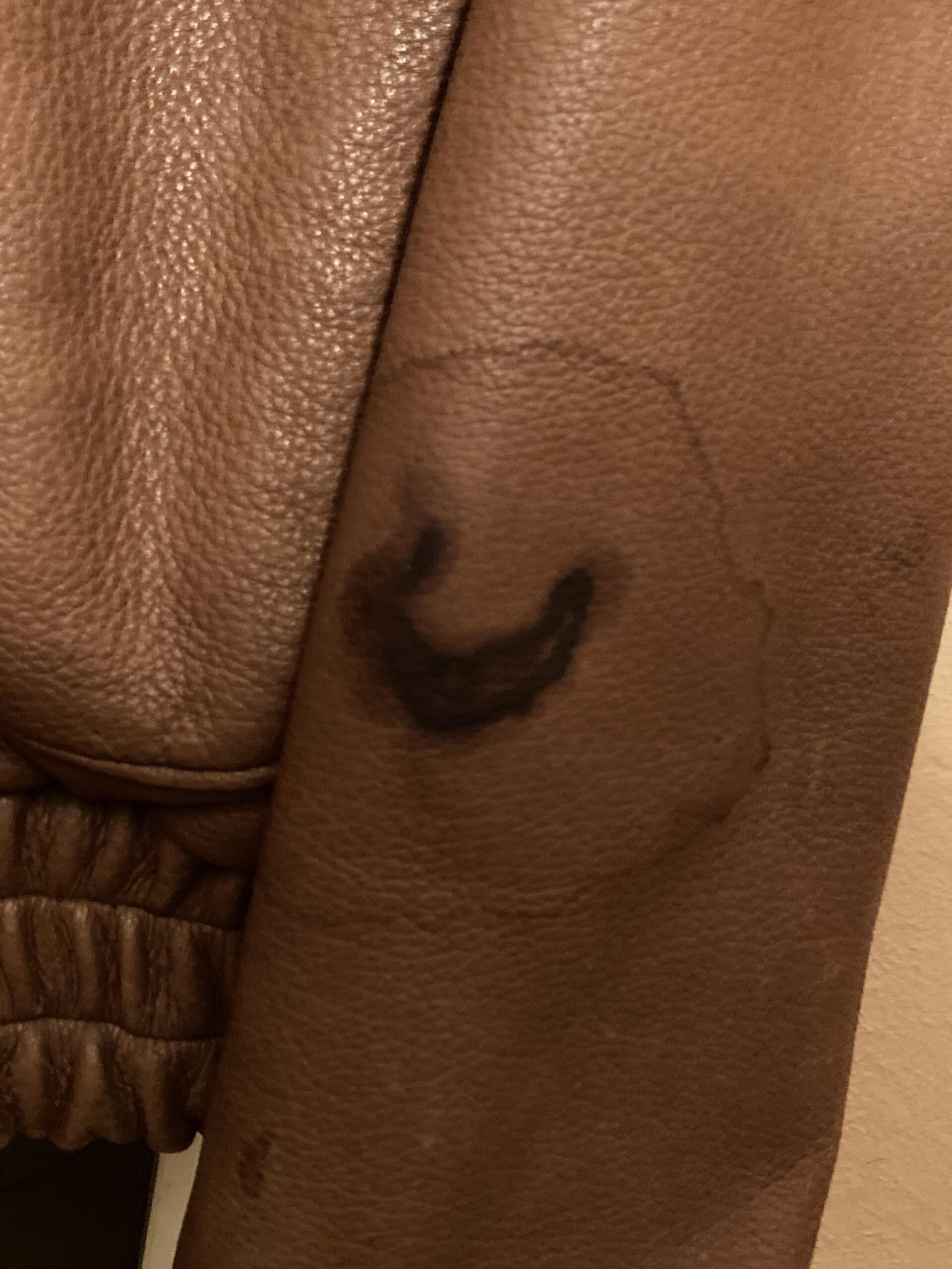 An application scenario or product detail of oil spot on leather - Image 16