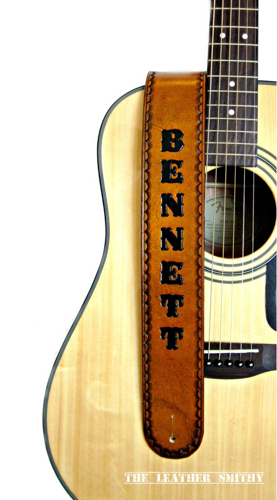 An application scenario or product detail of personalized custom leather guitar straps - Image 2