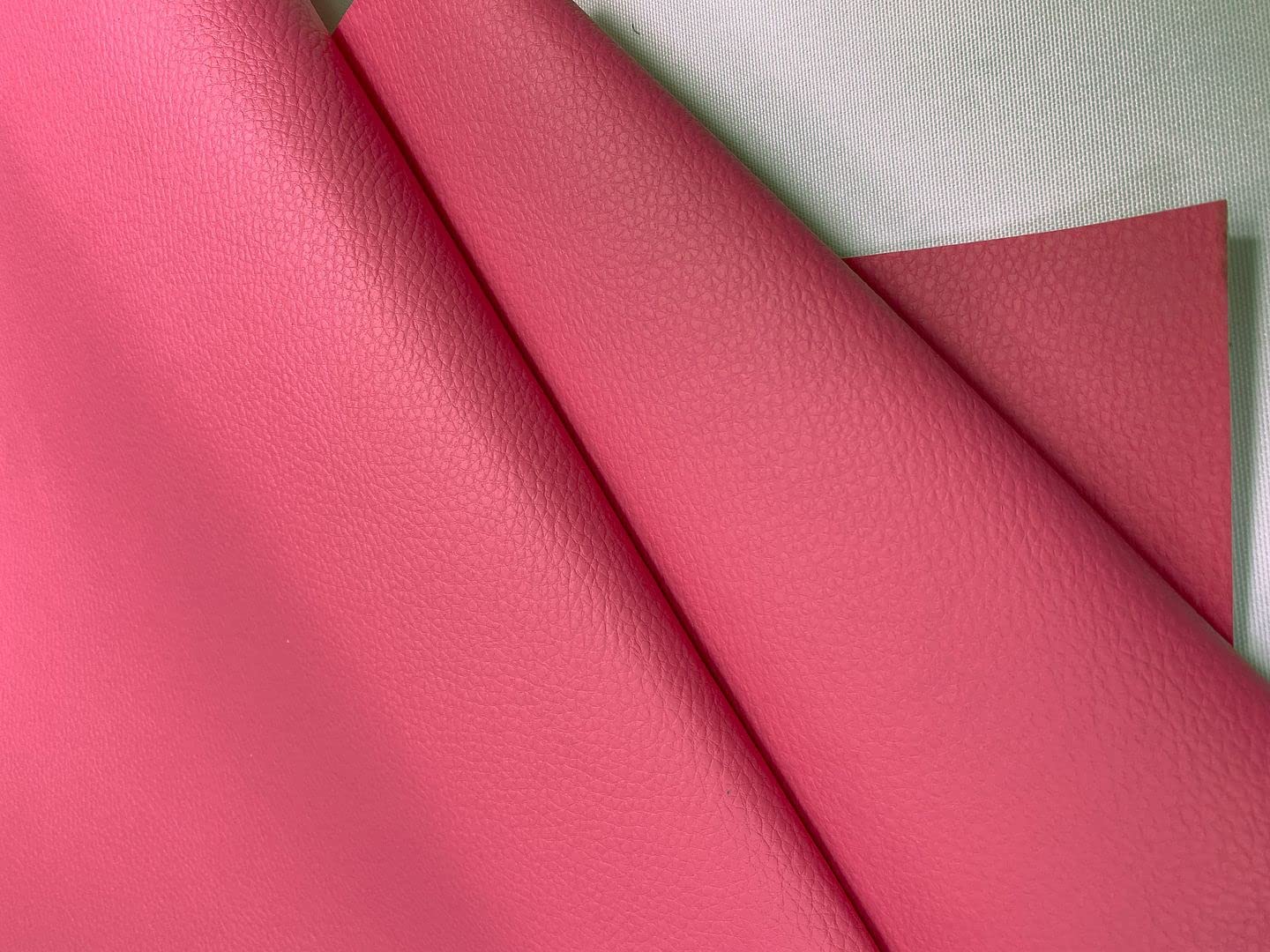 An application scenario or product detail of pink faux leather fabric - Image 4