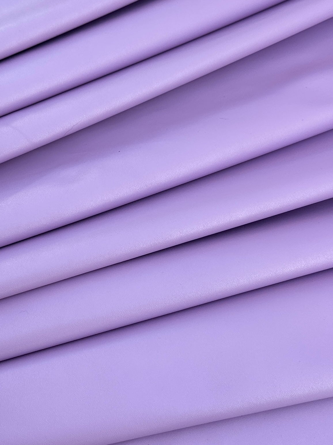 An application scenario or product detail of purple leather fabric - Image 16