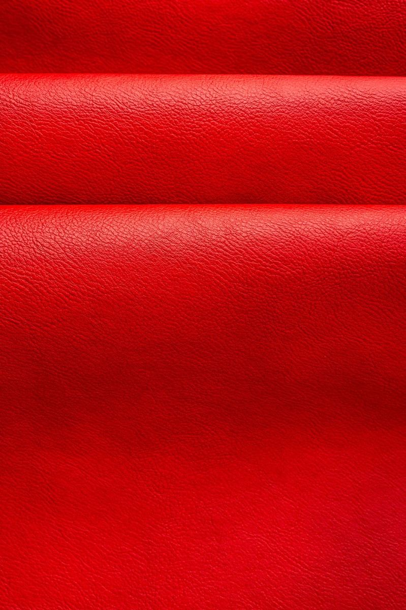 An application scenario or product detail of red fake leather fabric - Image 13