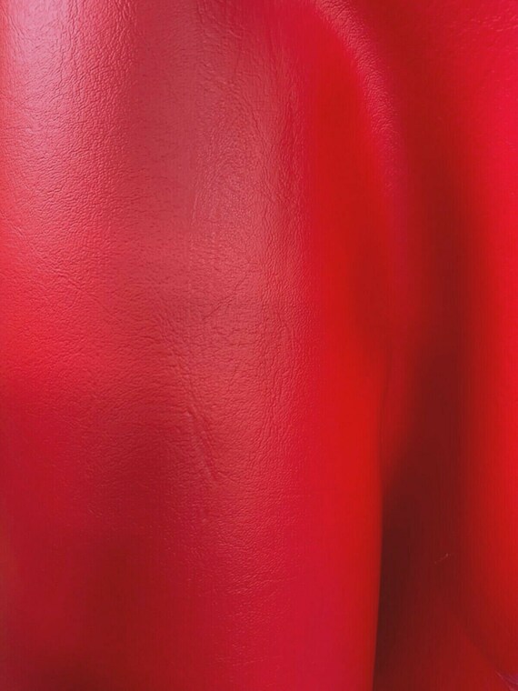An application scenario or product detail of red faux leather fabric - Image 13