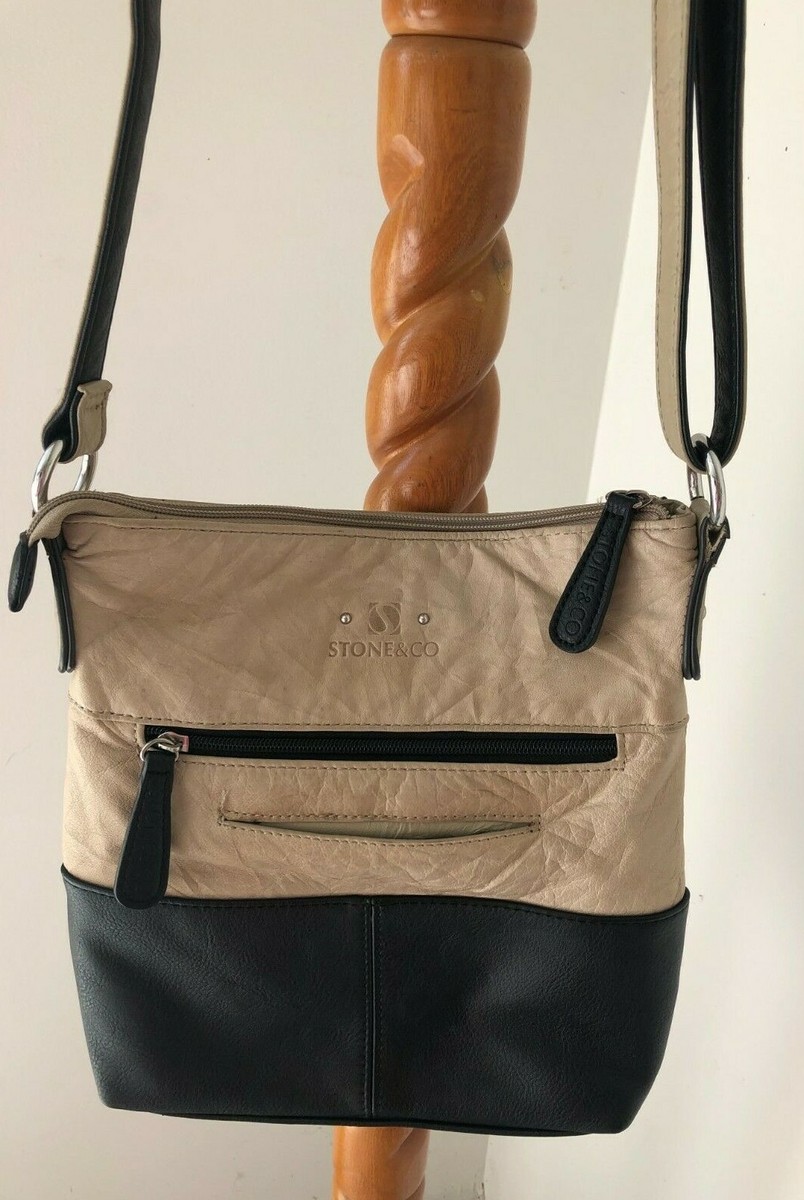 An application scenario or product detail of stone and company leather purses - Image 1