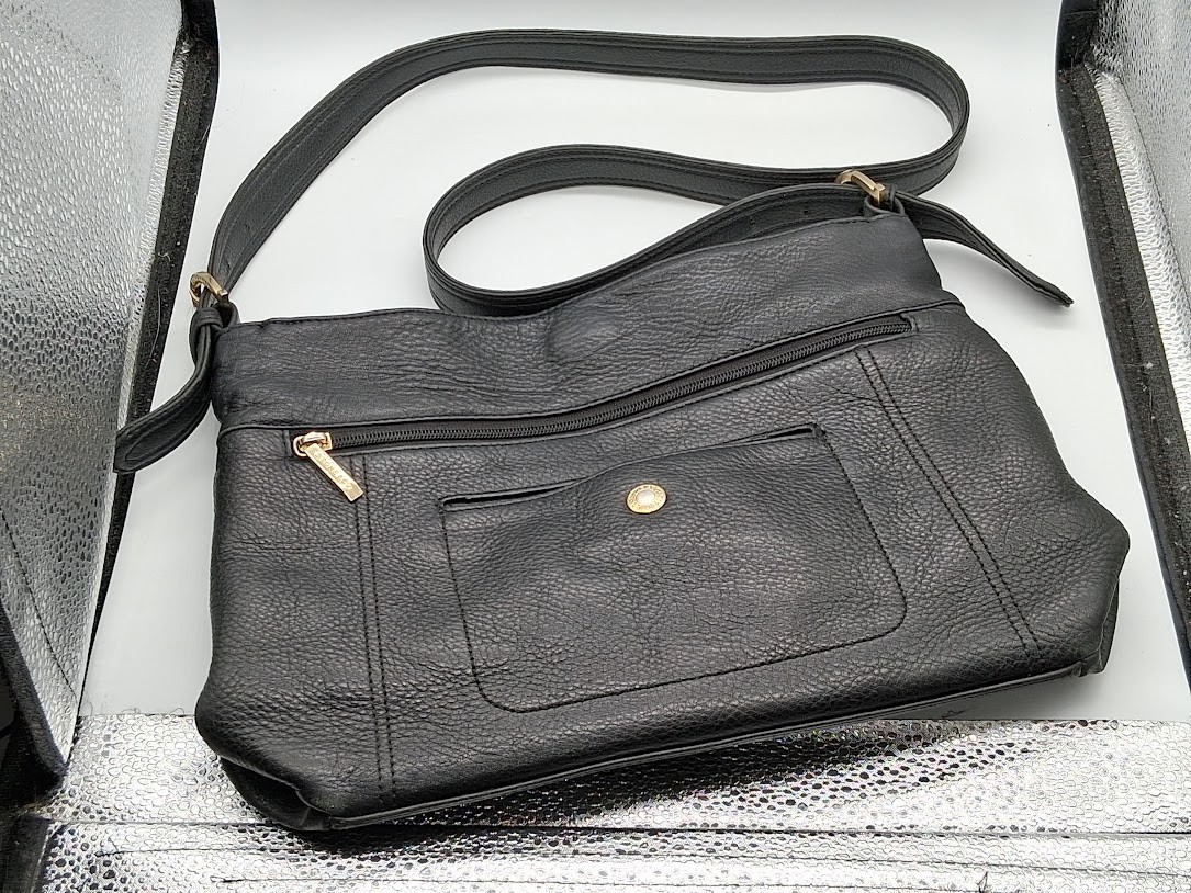 An application scenario or product detail of stone and company leather purses - Image 8