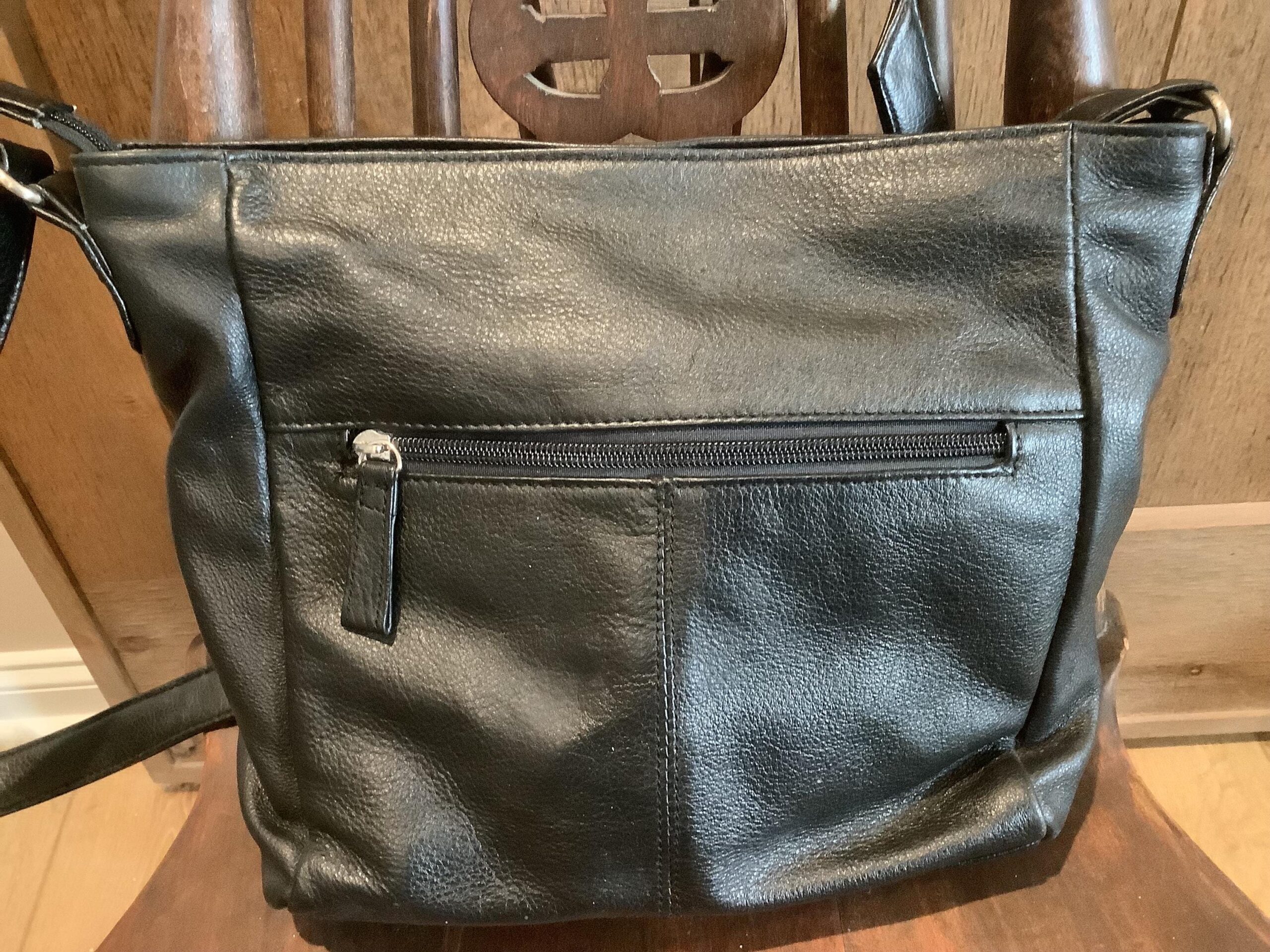 An application scenario or product detail of stone and company leather purses - Image 18