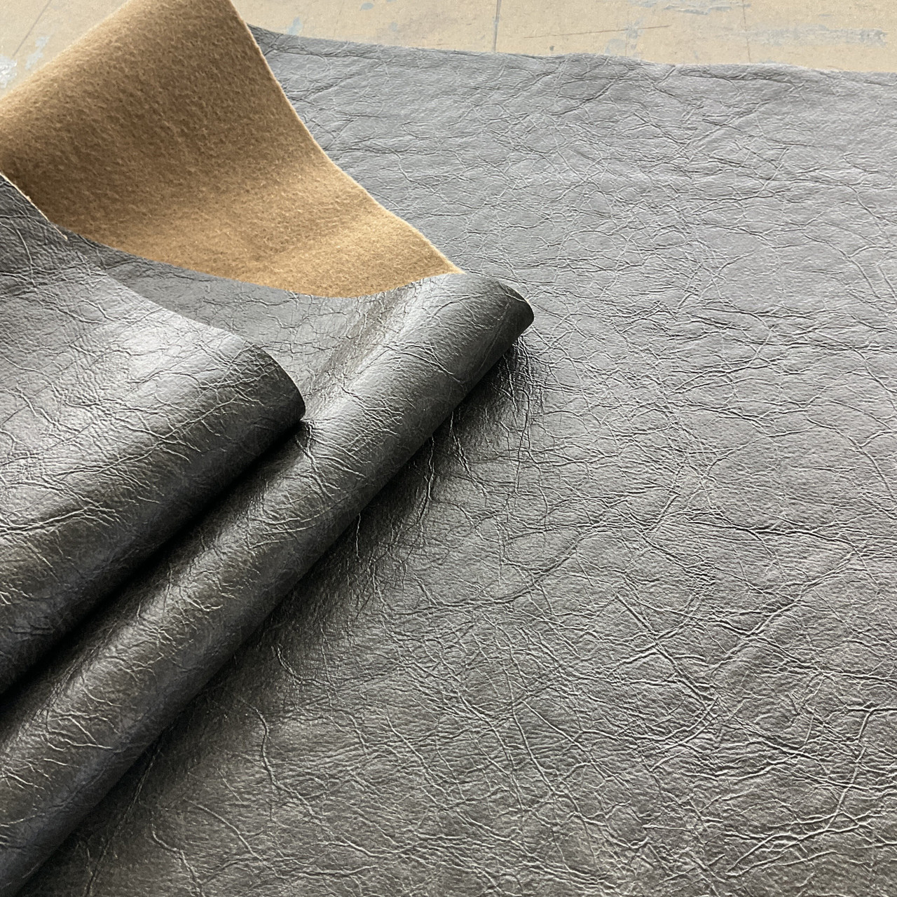 An application scenario or product detail of synthetic leather fabric by the yard - Image 17