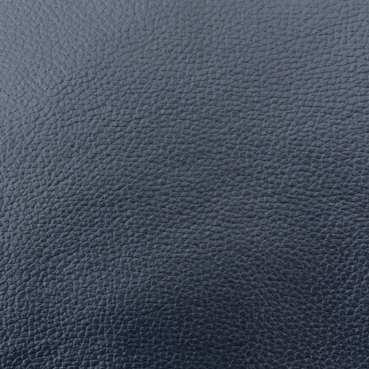 An application scenario or product detail of textured leather fabric - Image 4