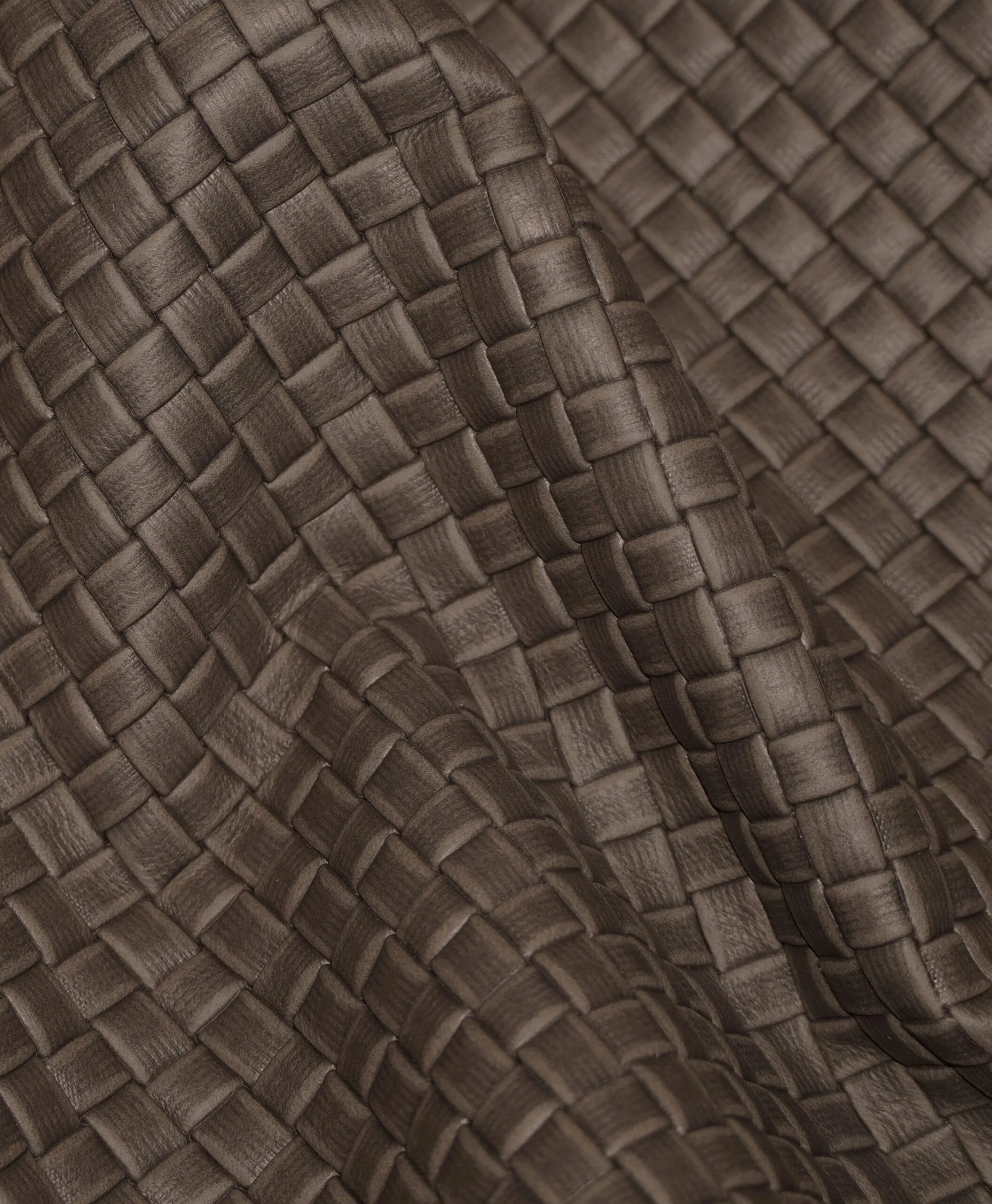 An application scenario or product detail of textured leather fabric - Image 8