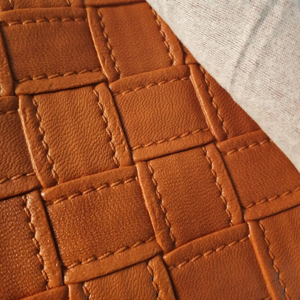 An application scenario or product detail of textured leather fabric - Image 16
