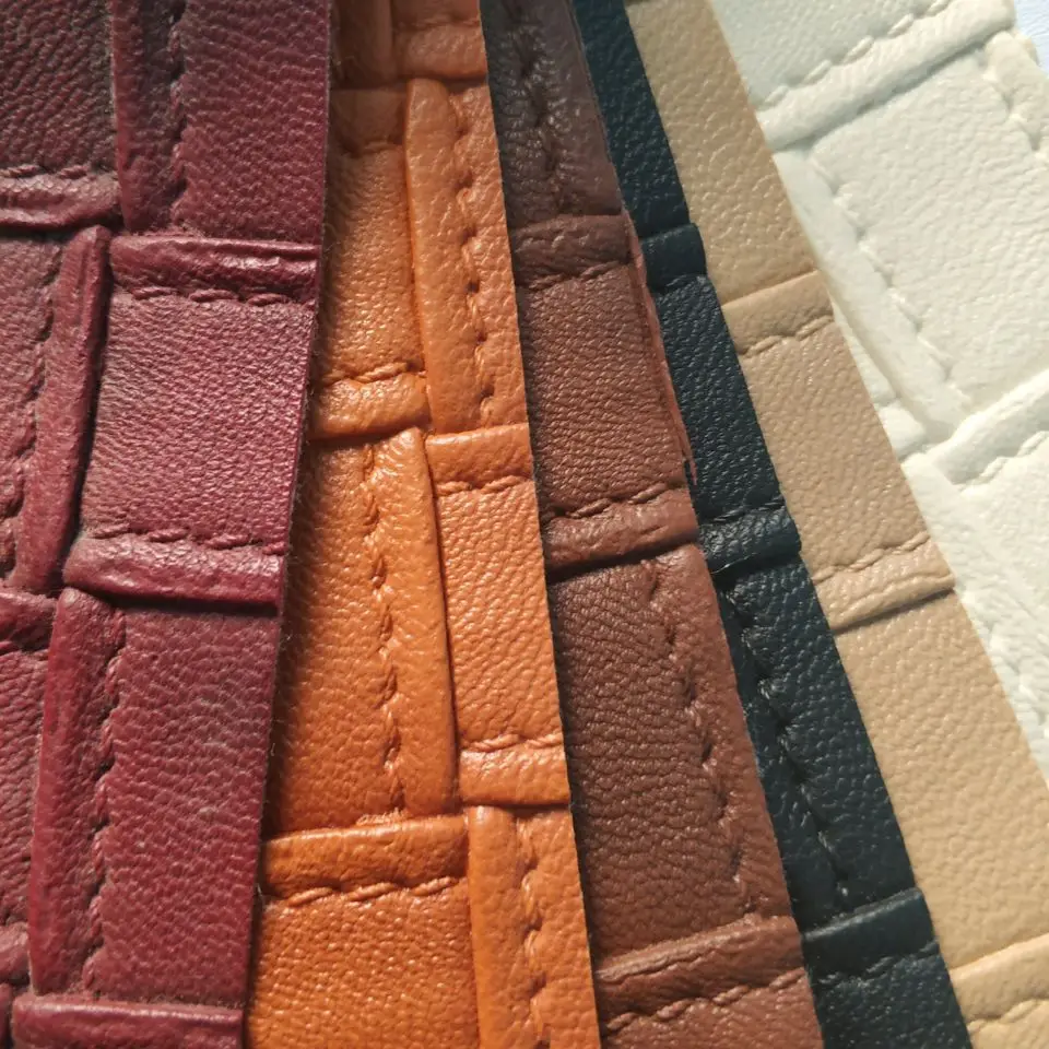 An application scenario or product detail of textured leather fabric - Image 19