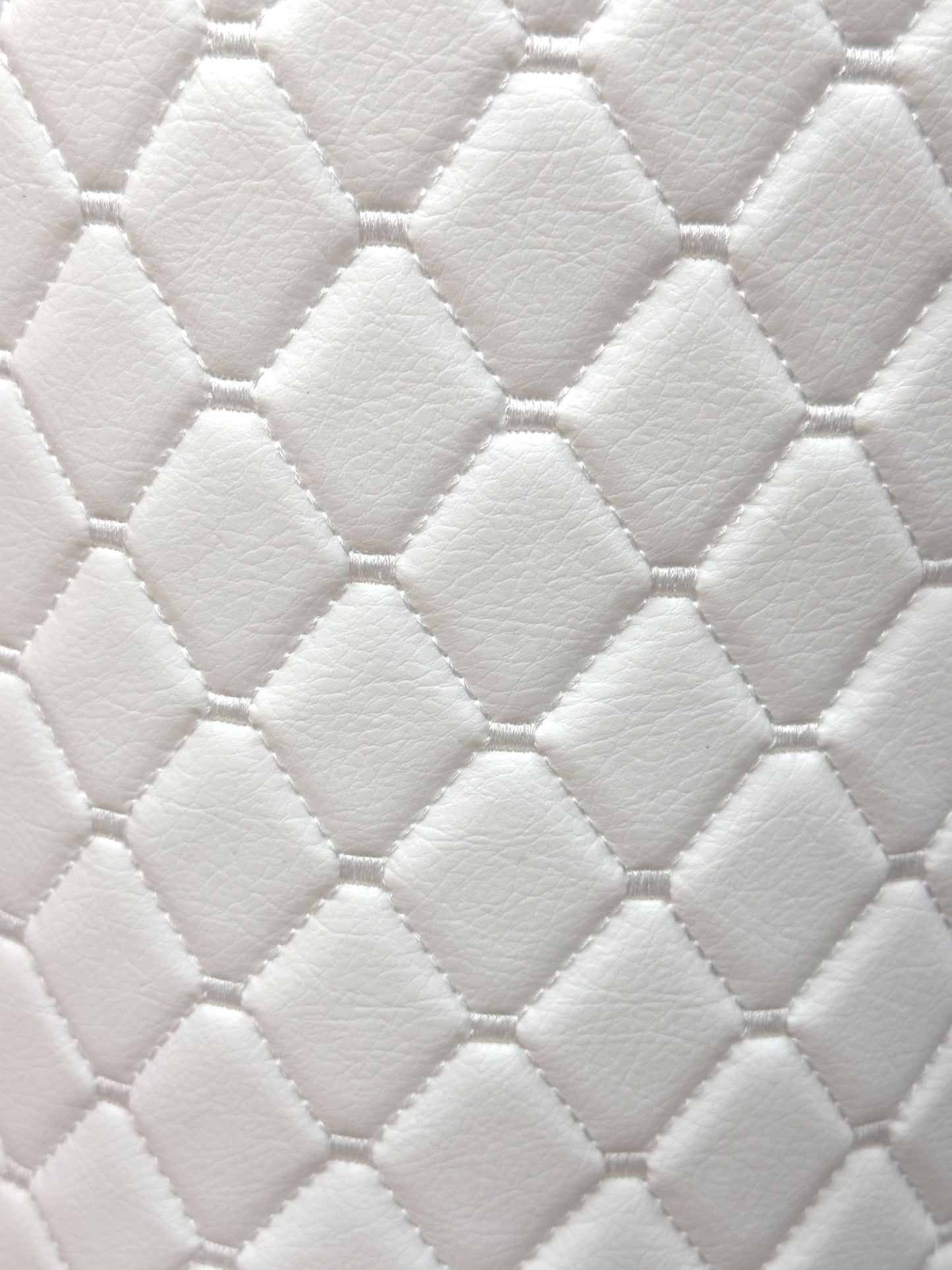An application scenario or product detail of white faux leather fabric - Image 9