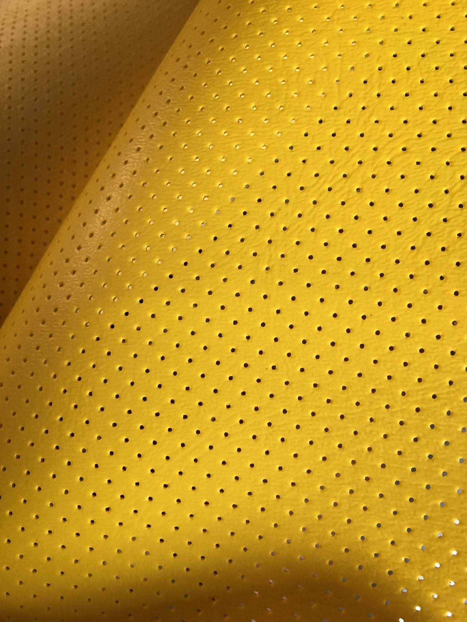 An application scenario or product detail of yellow faux leather fabric - Image 16