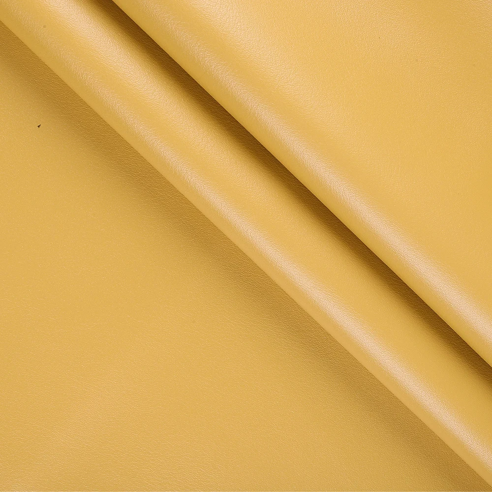 An application scenario or product detail of yellow faux leather fabric - Image 18