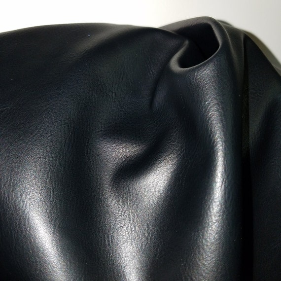 An application scenario or product detail of black faux leather upholstery fabric - Image 10
