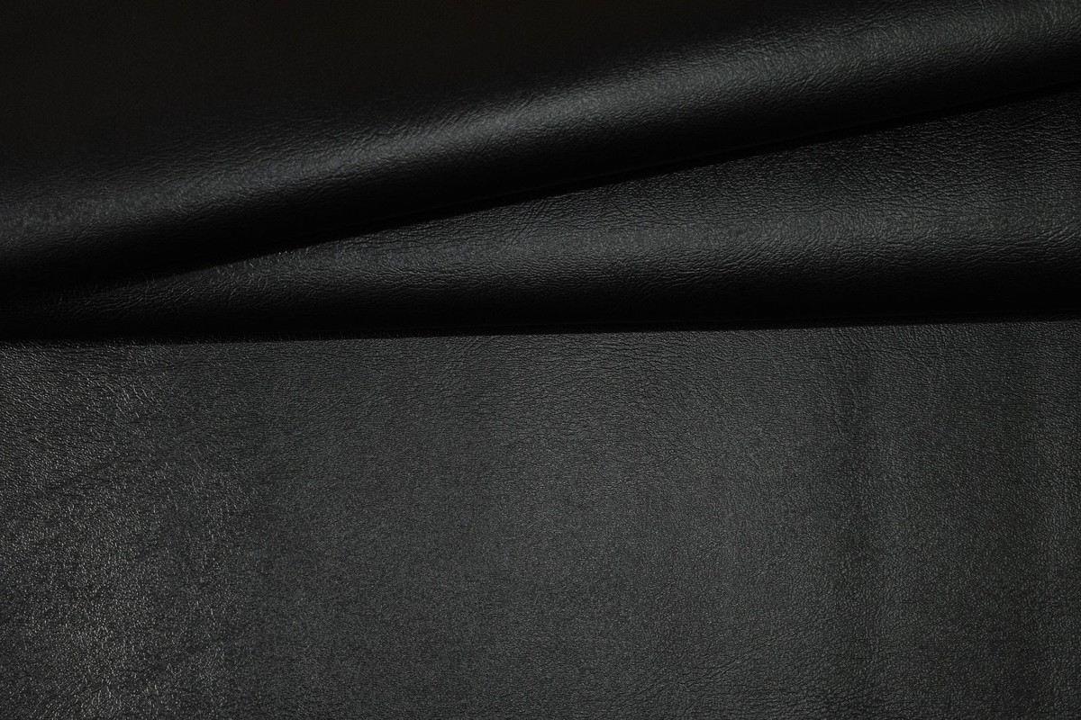 An application scenario or product detail of black faux leather upholstery fabric - Image 11