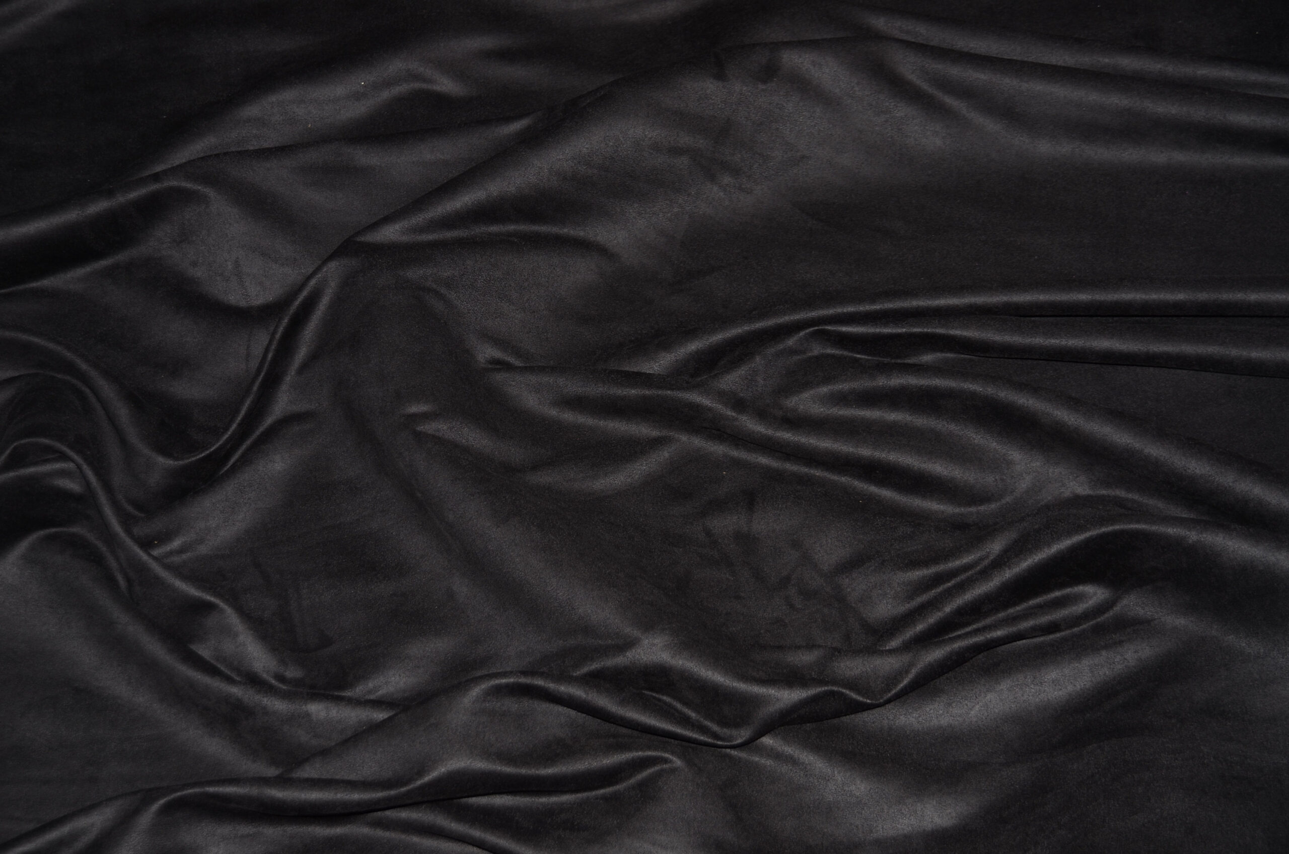 An application scenario or product detail of black faux suede fabric - Image 8