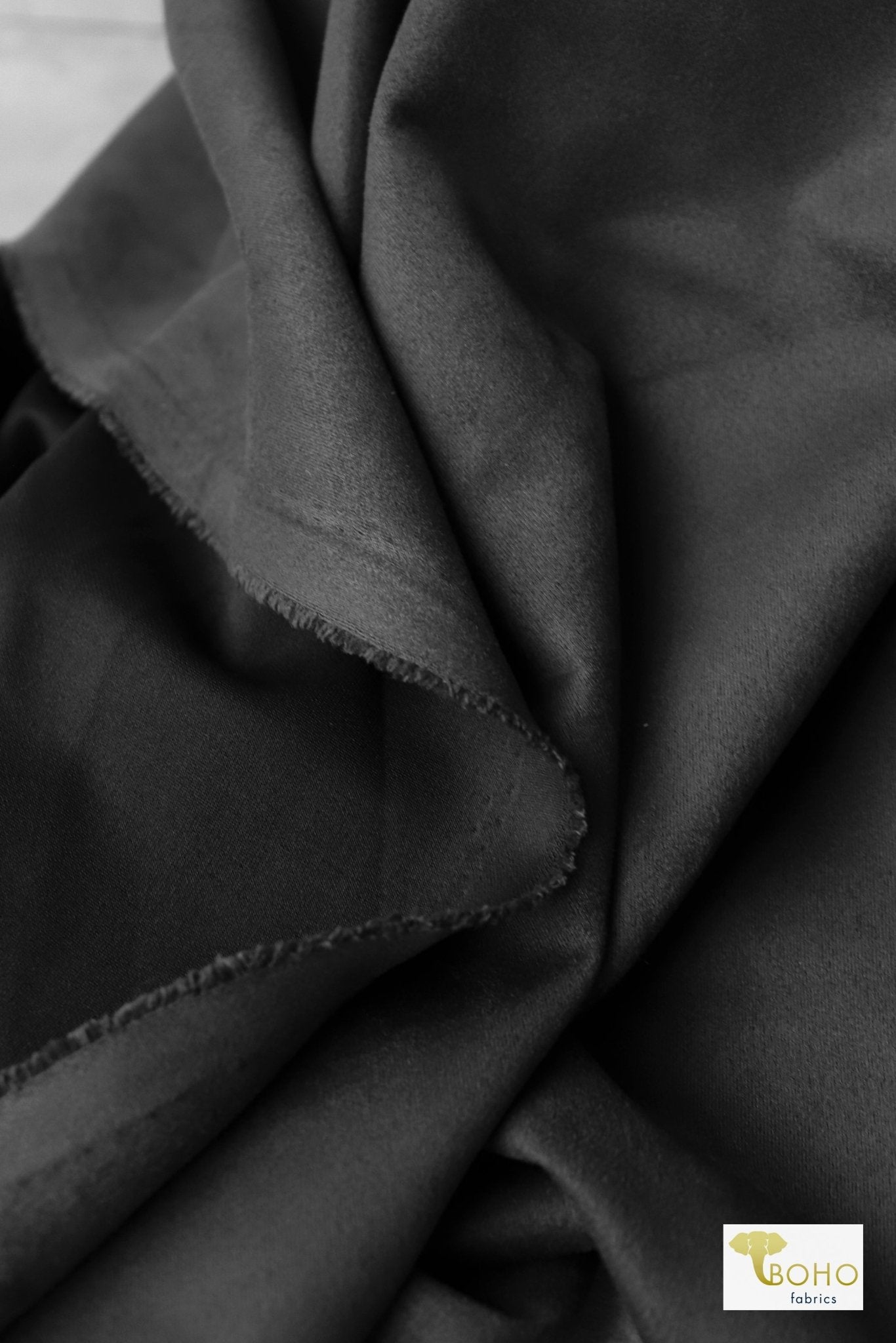 An application scenario or product detail of black faux suede material - Image 13