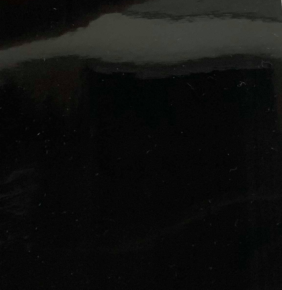 An application scenario or product detail of black leather upholstery fabric - Image 9