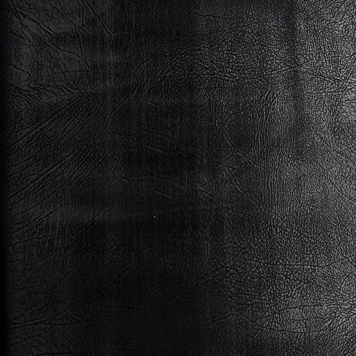 An application scenario or product detail of black suede leather fabric - Image 4