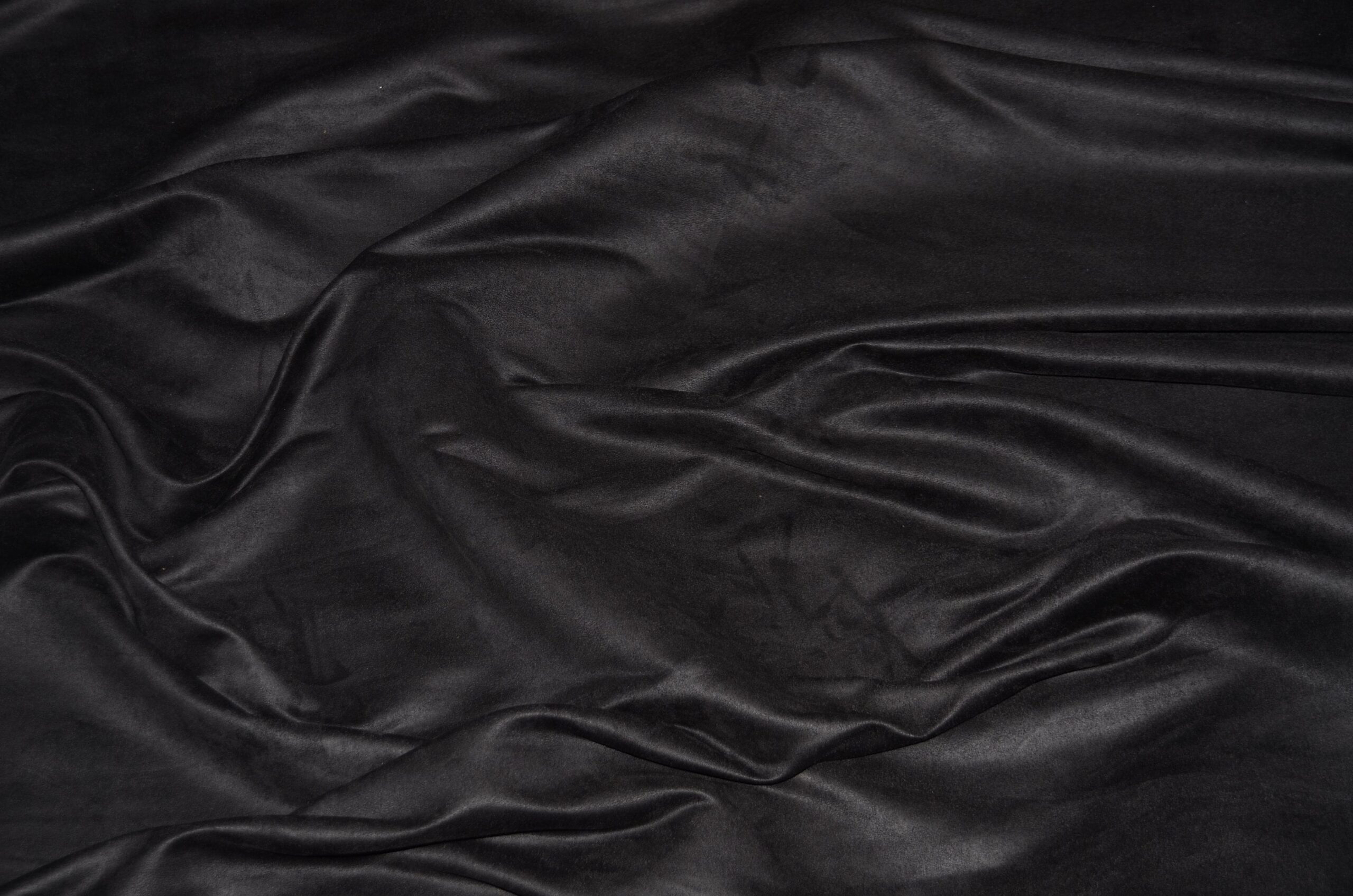 An application scenario or product detail of black suede leather fabric - Image 8