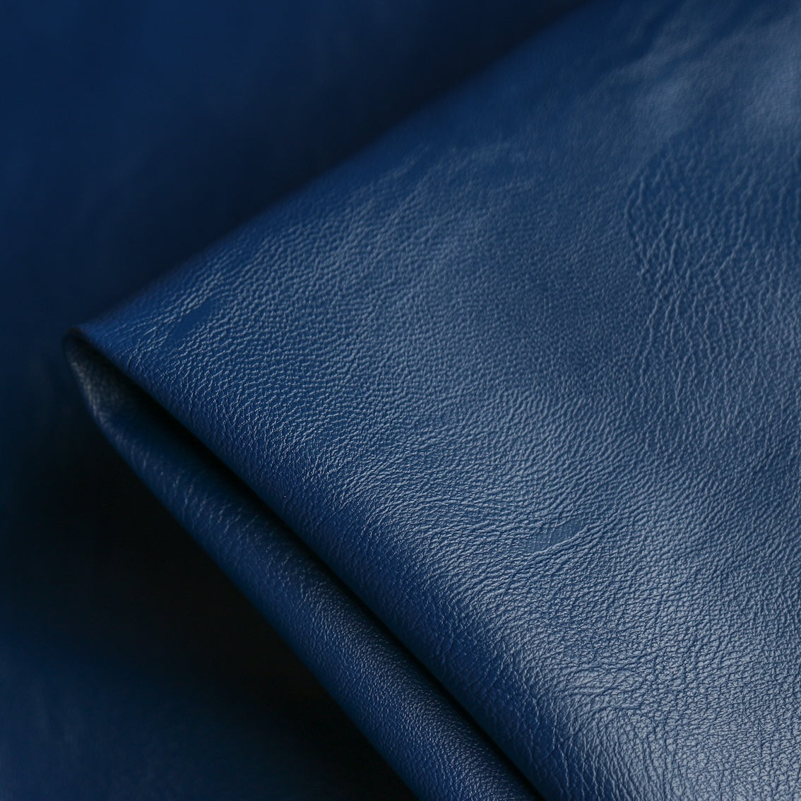An application scenario or product detail of blue faux leather fabric - Image 18