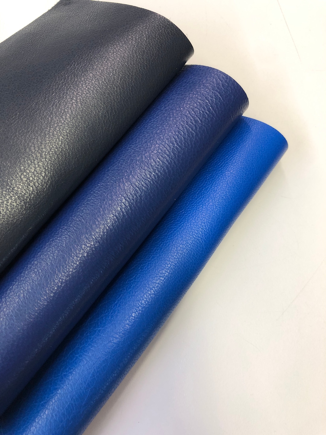 An application scenario or product detail of blue leather fabric - Image 13