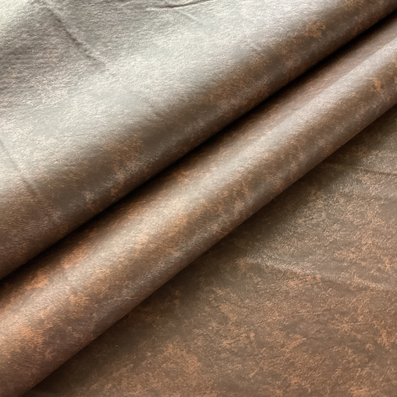 An application scenario or product detail of brown fake leather fabric - Image 12