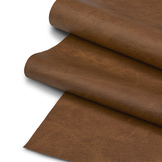 An application scenario or product detail of brown fake leather fabric - Image 19