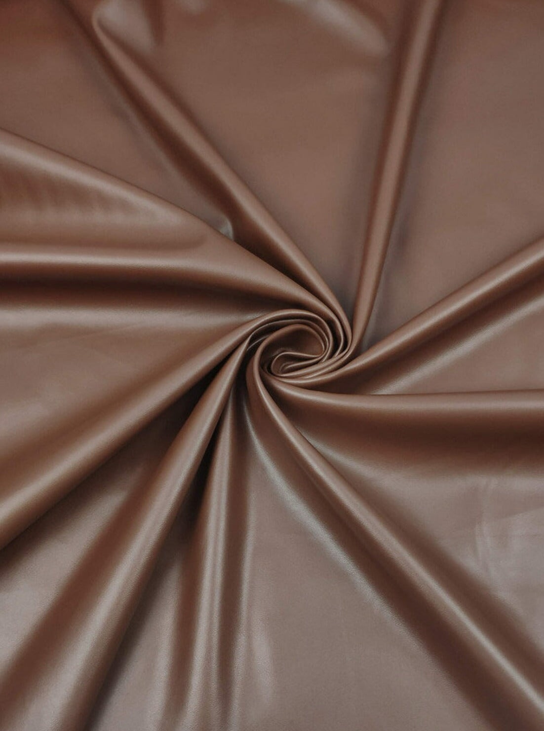 An application scenario or product detail of brown faux leather fabric - Image 13