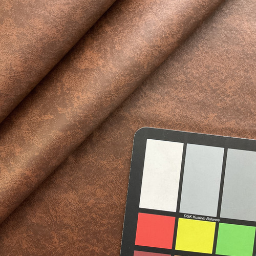 An application scenario or product detail of brown faux leather fabric - Image 18