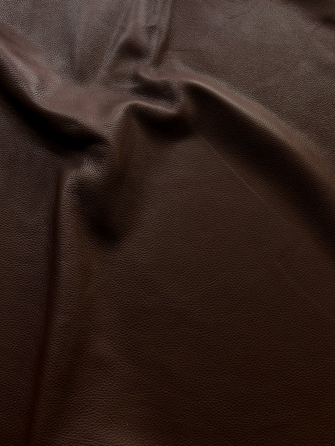 An application scenario or product detail of brown leather fabric - Image 15