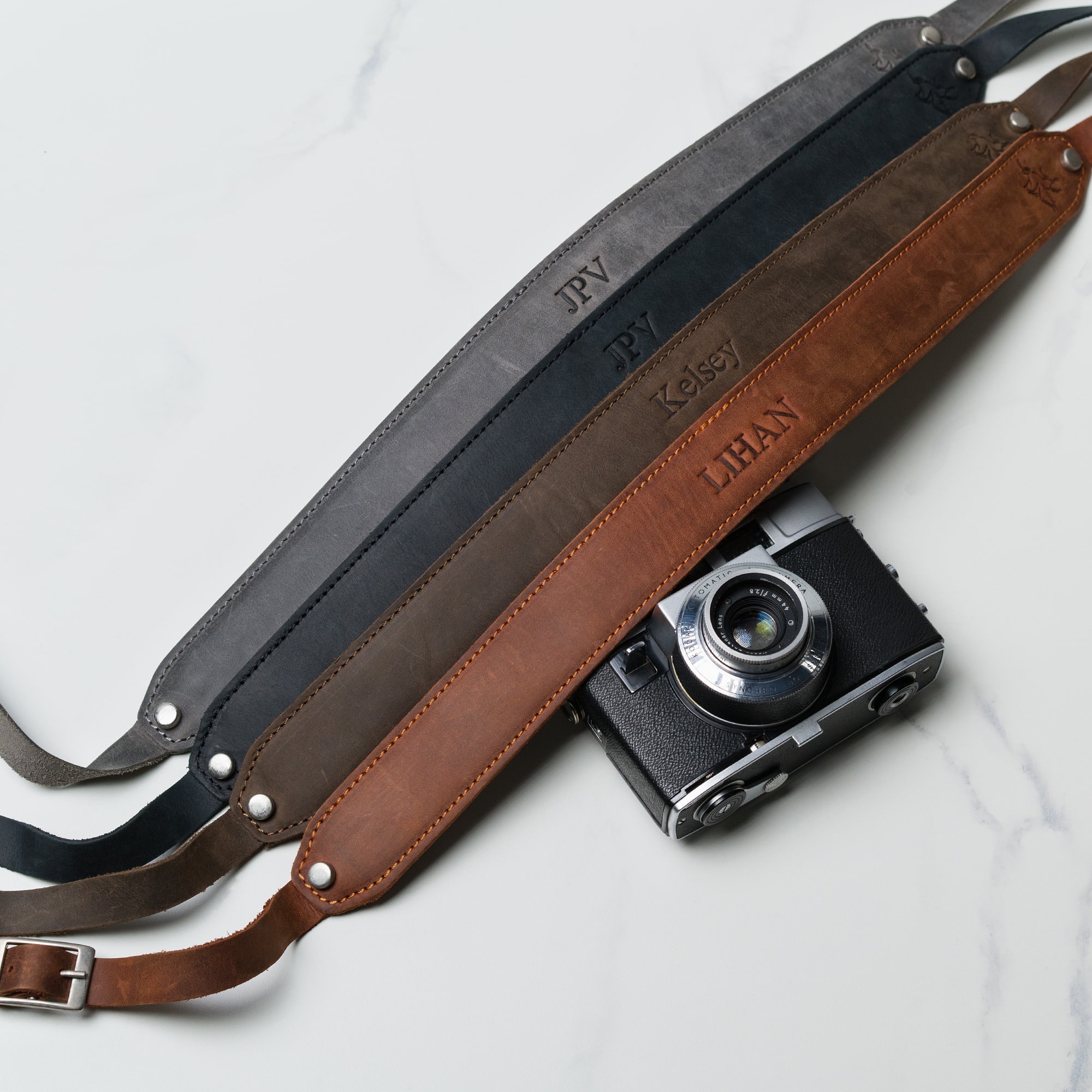 An application scenario or product detail of custom leather camera strap - Image 1