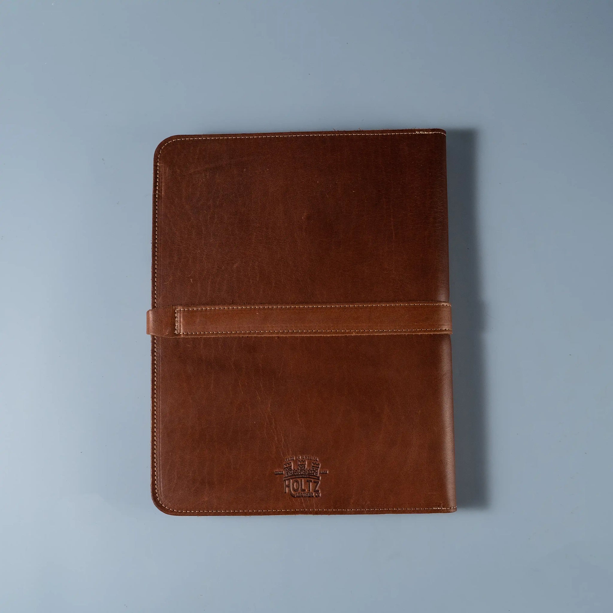 An application scenario or product detail of custom leather portfolio with logo - Image 13