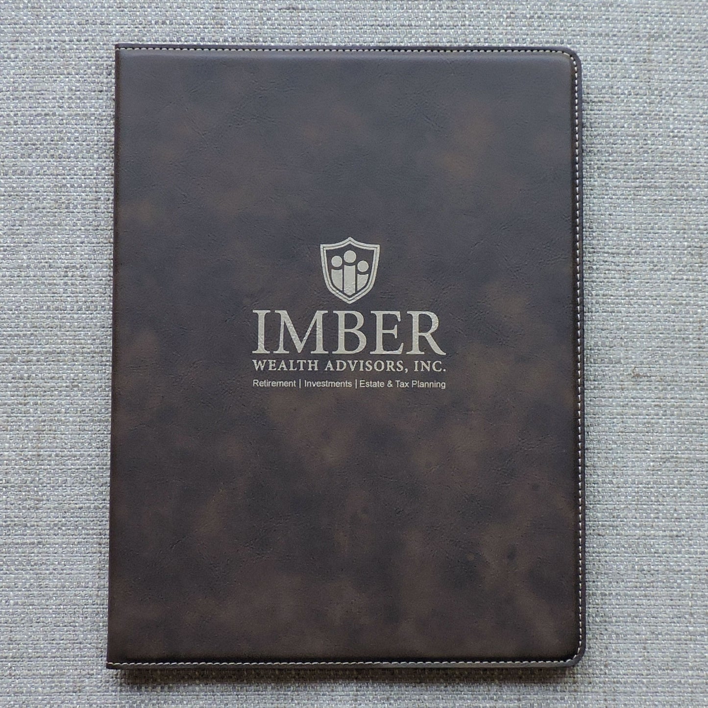 An application scenario or product detail of custom leather portfolio with logo - Image 16