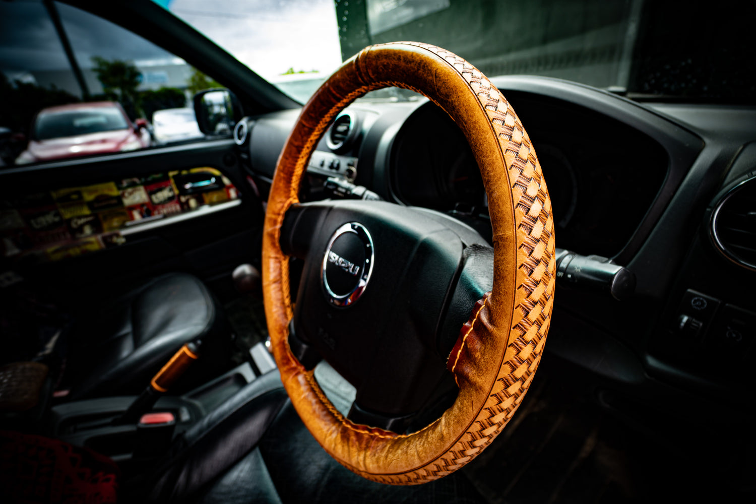 An application scenario or product detail of custom leather steering wheel covers - Image 1