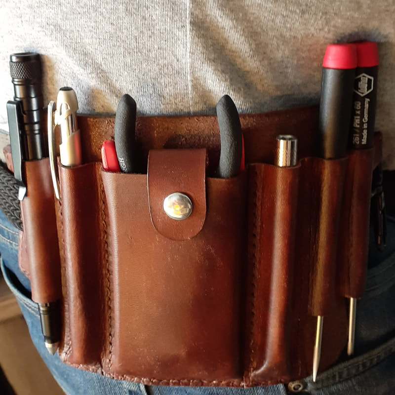 An application scenario or product detail of custom leather tool pouch - Image 20