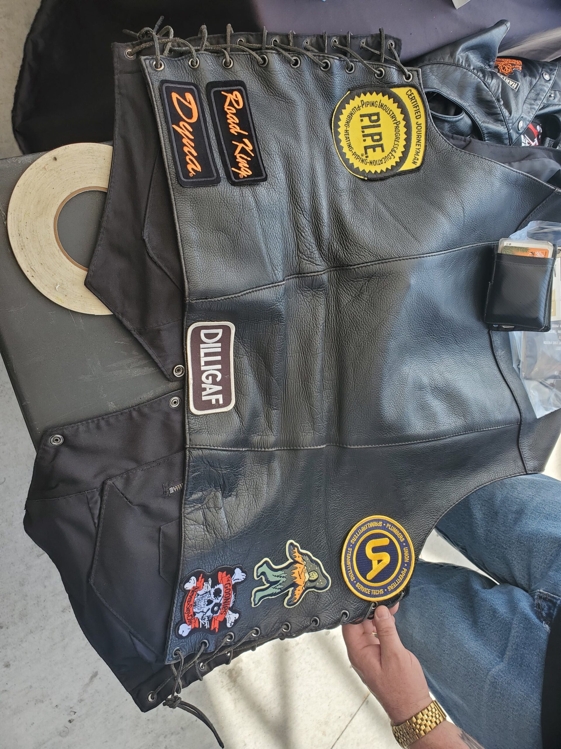 An application scenario or product detail of custom patches for leather vest - Image 8