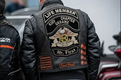 An application scenario or product detail of custom patches for leather vest - Image 23