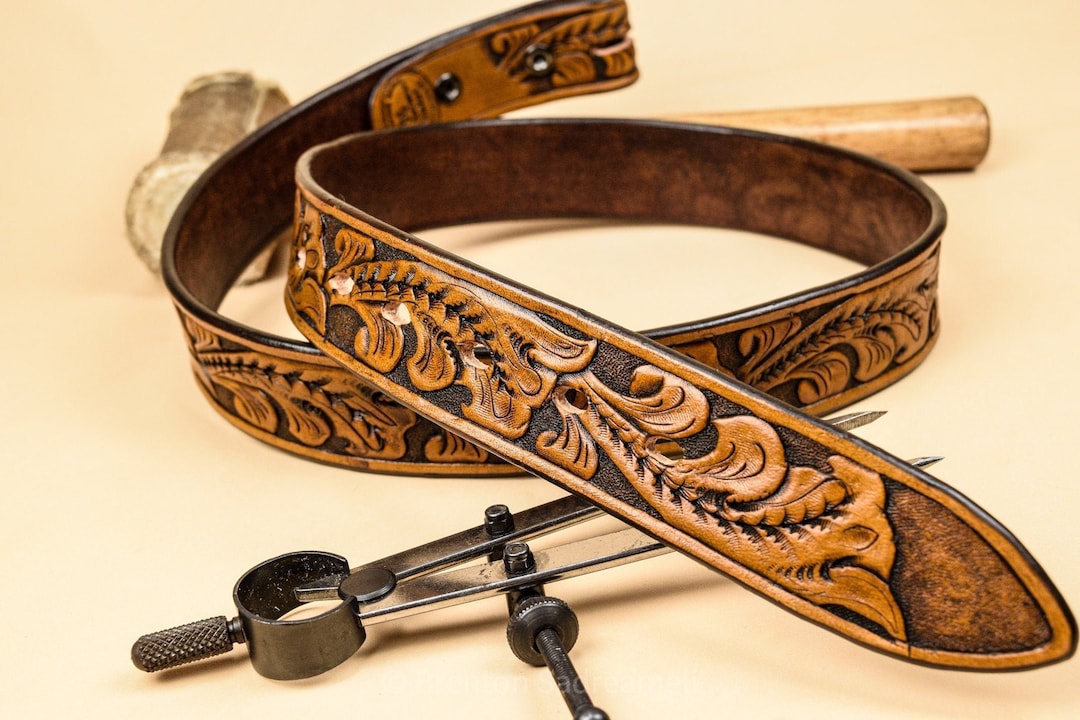 An application scenario or product detail of custom tooled leather belts - Image 5