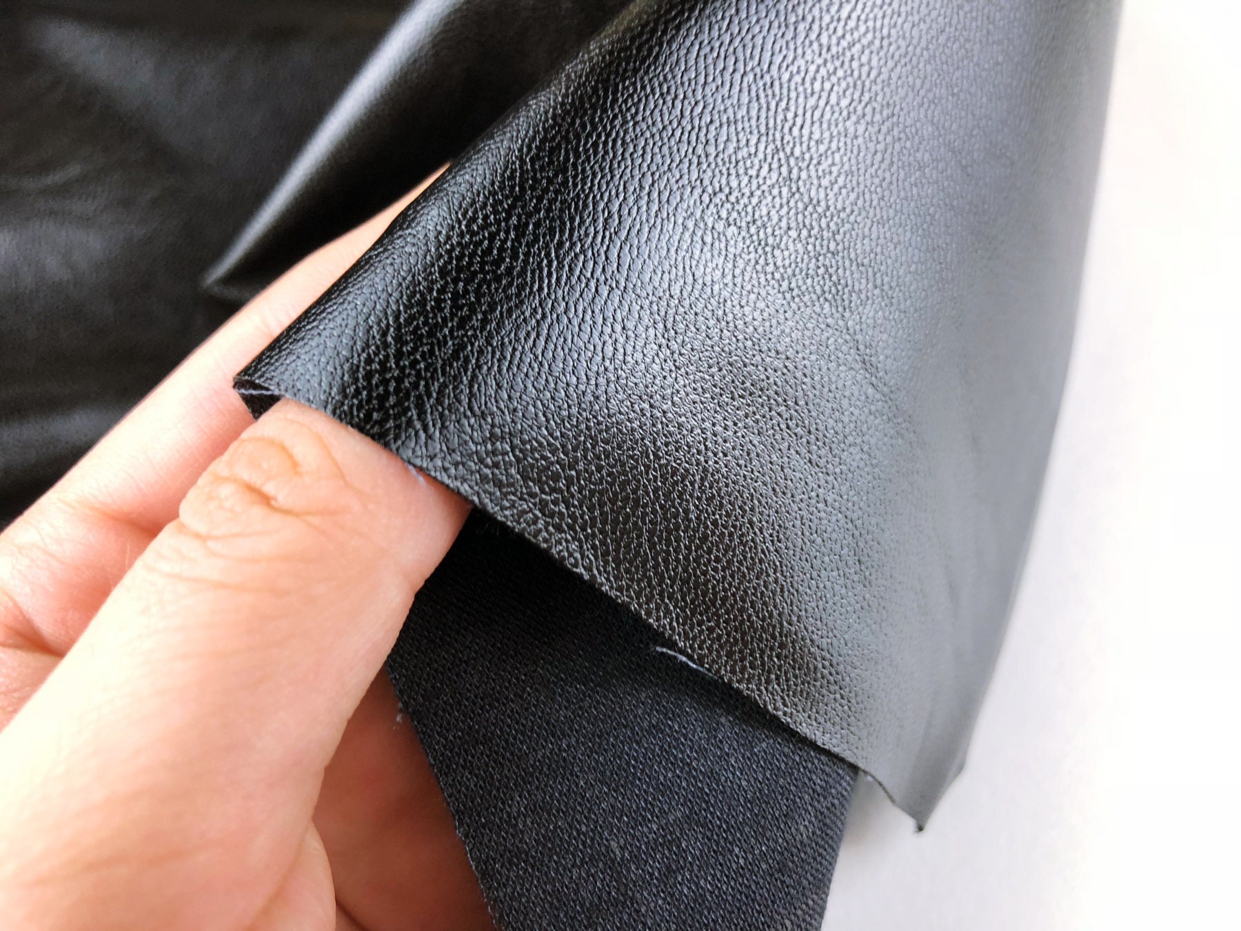 An application scenario or product detail of fake leather fabric - Image 4