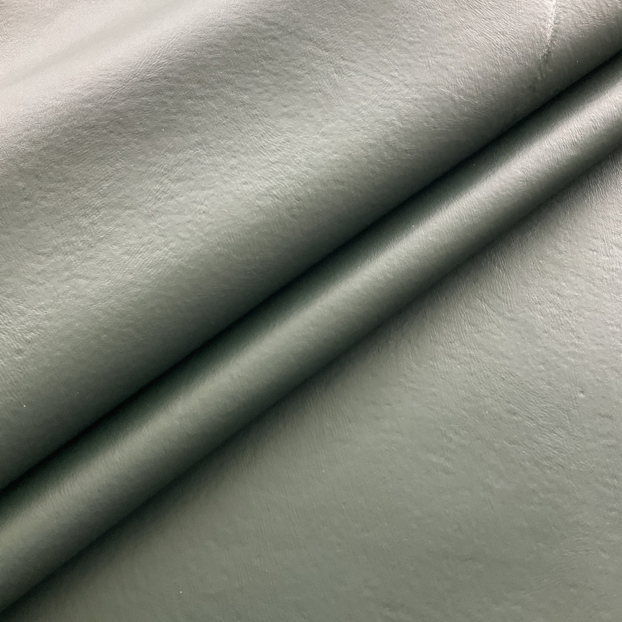 An application scenario or product detail of faux leather fabric by the yard - Image 13