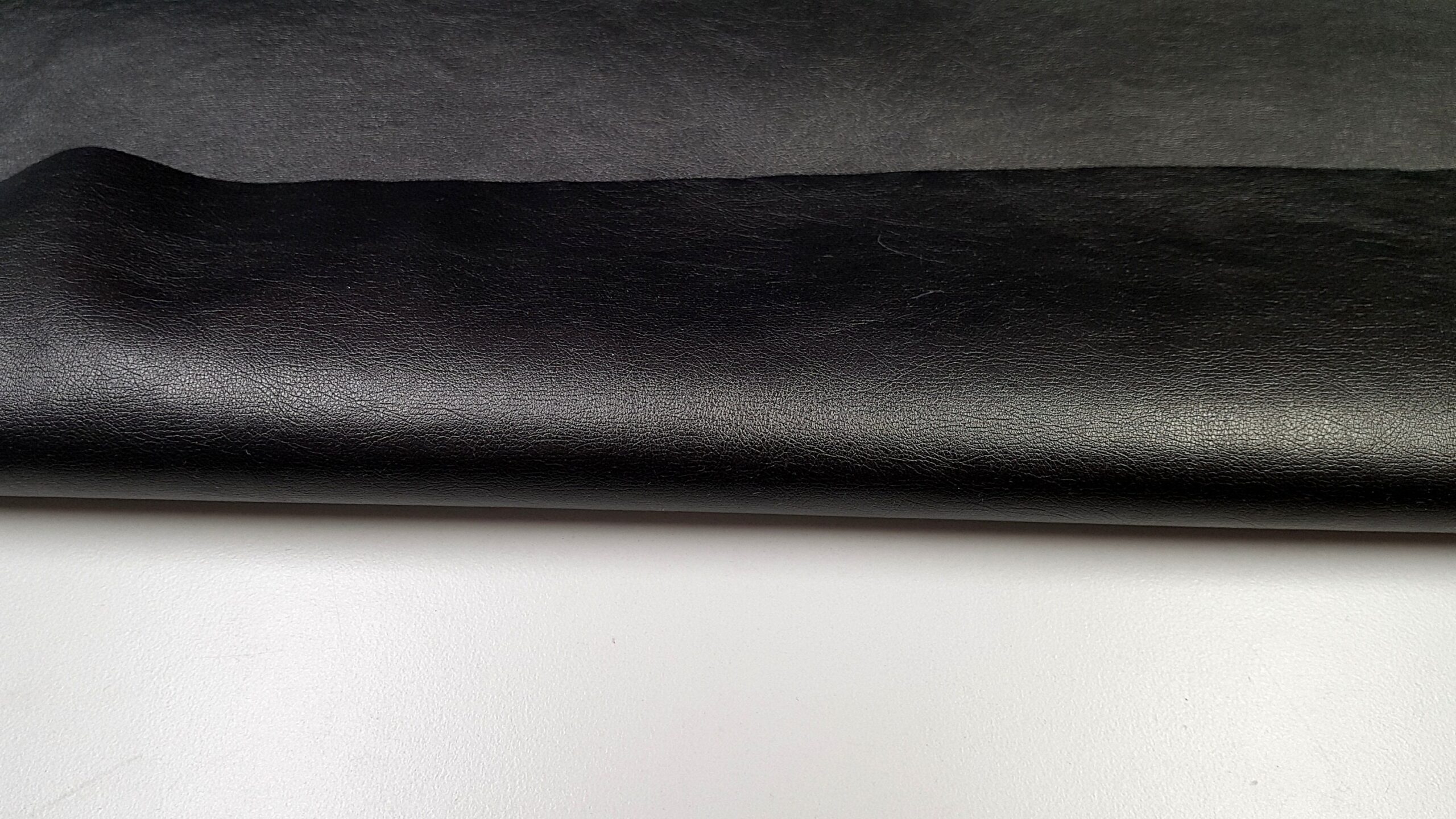 An application scenario or product detail of faux leather fabric for bag making - Image 14