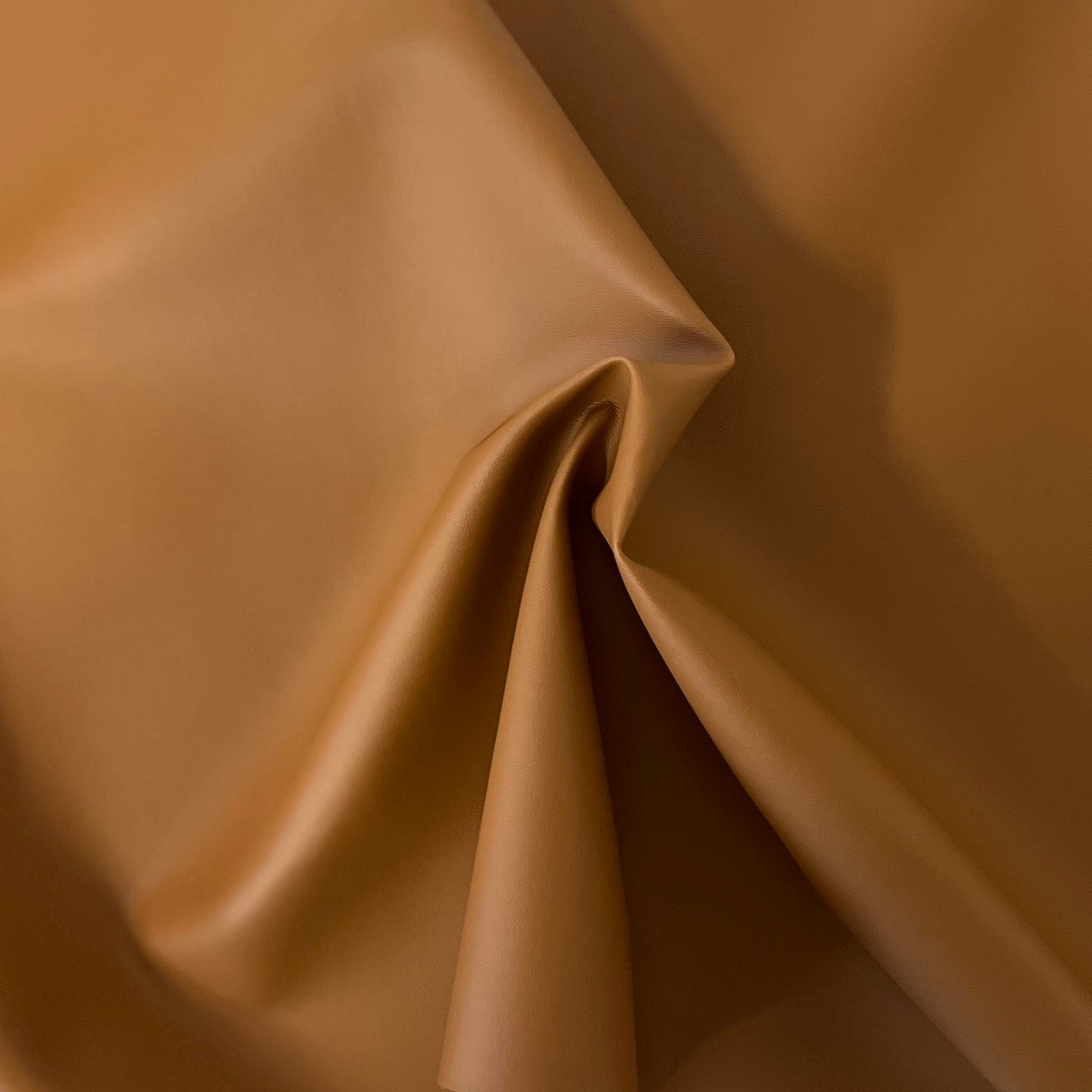 An application scenario or product detail of faux leather garment fabric - Image 19