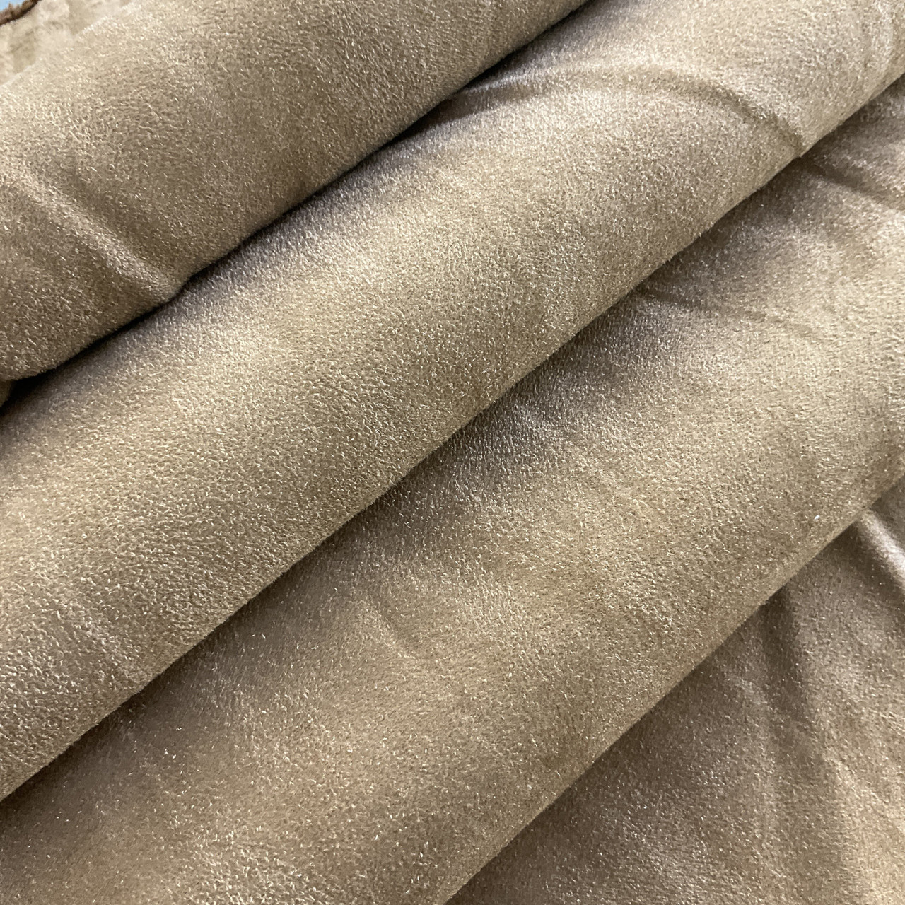 An application scenario or product detail of faux suede fabric for clothing - Image 12