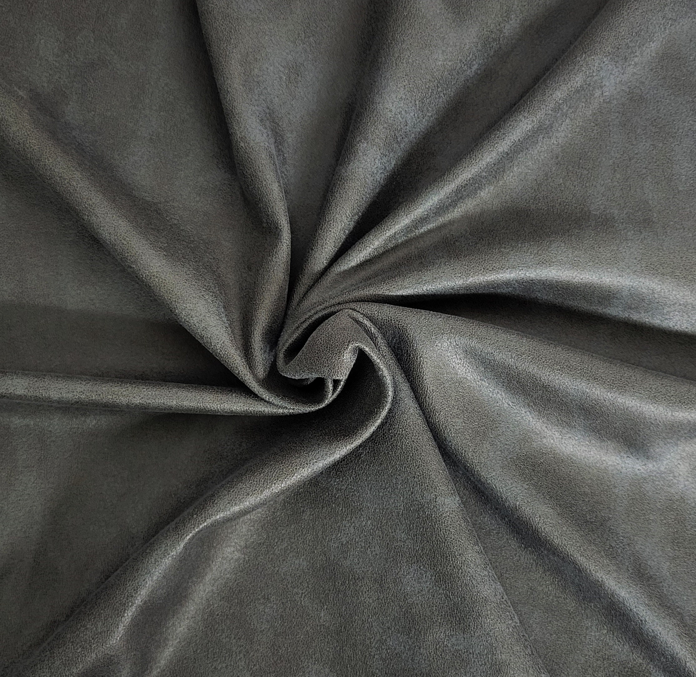 An application scenario or product detail of gray leather fabric - Image 13