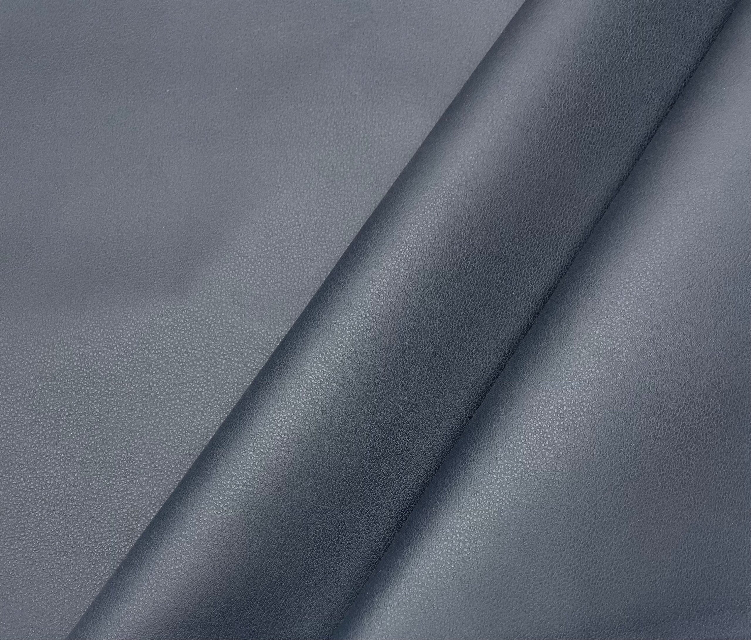 An application scenario or product detail of gray leather fabric - Image 23