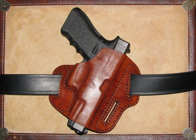 An application scenario or product detail of how to make a leather gun holster - Image 7