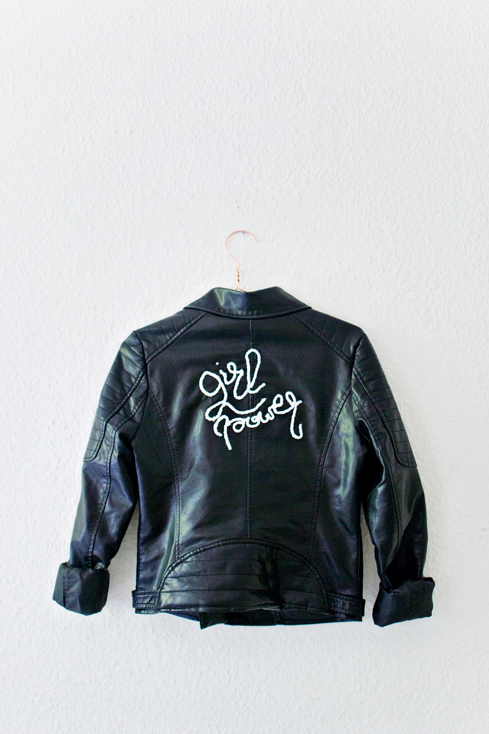 An application scenario or product detail of leather jacket custom embroidery - Image 6